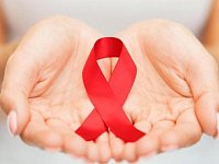 Красная ленточка - символ борьбы со СПИДом